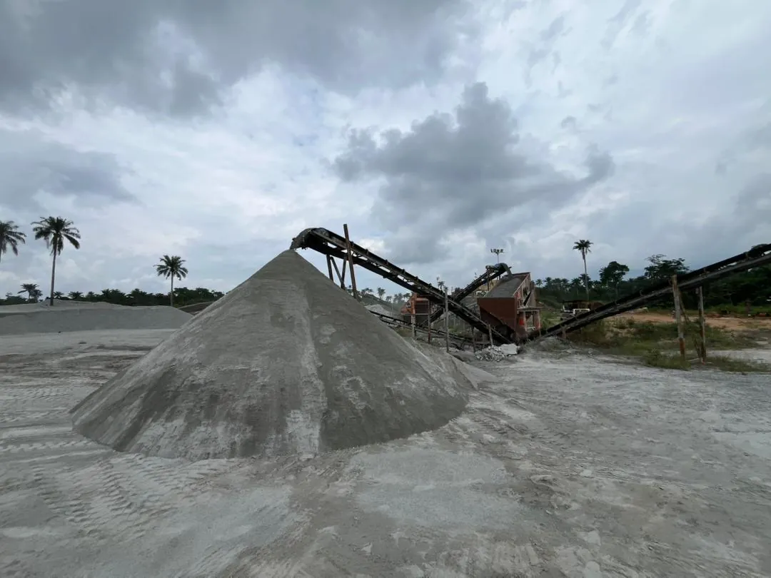 Processed stone-dust stockpile beside the crushing plant at Akinchang's Okeigbo Quarry